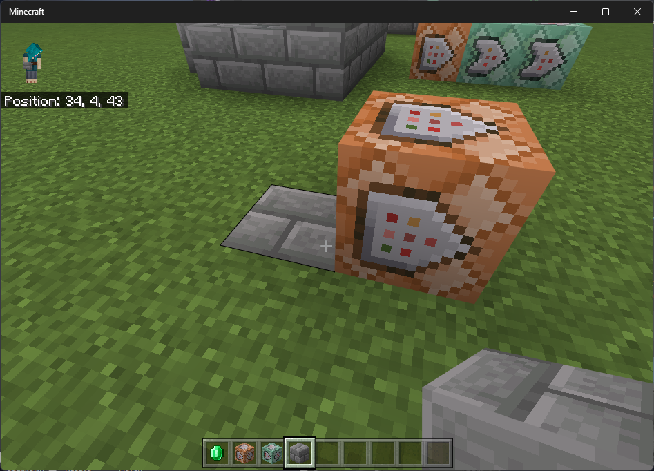 Screenshot showing a command block pointing horizontally to the right, with an empty space behind the command block (illustrated with stone bricks beneath the space)